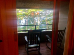 A small porch with peek-a-boo views of Lake George